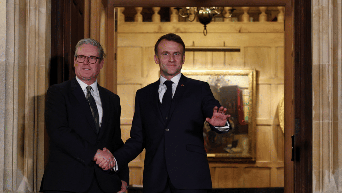 British Prime Minister Keir Starmer and French President Emmanuel Macron shake hands ahead of a bilateral meeting at Chequers, near Aylesbury, Britain, January 9, 2025 | Reuters