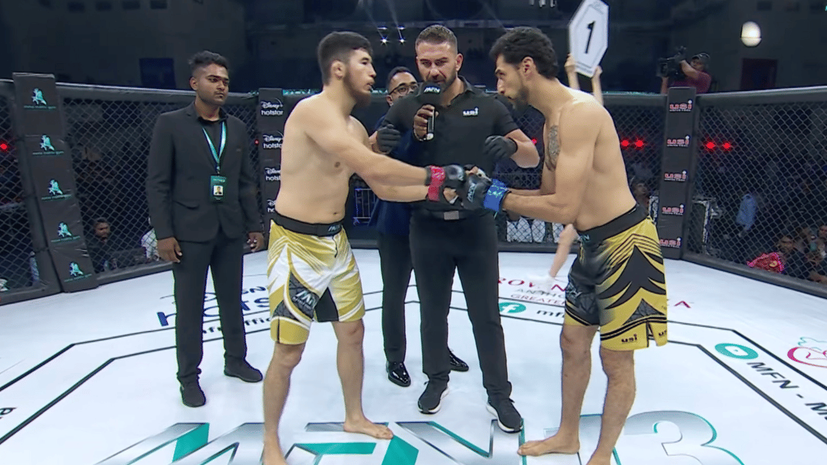 Jason Ramesh Solomon (right) with his opponent during a pre-fight briefing. | YouTube/©Matrix Fight Night 