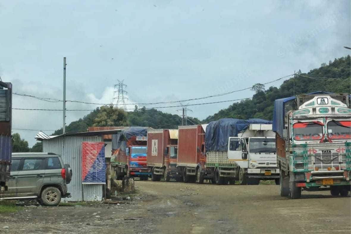 Trucks crossing the border of Kangpokpi village | Praveen Jain | ThePrint 