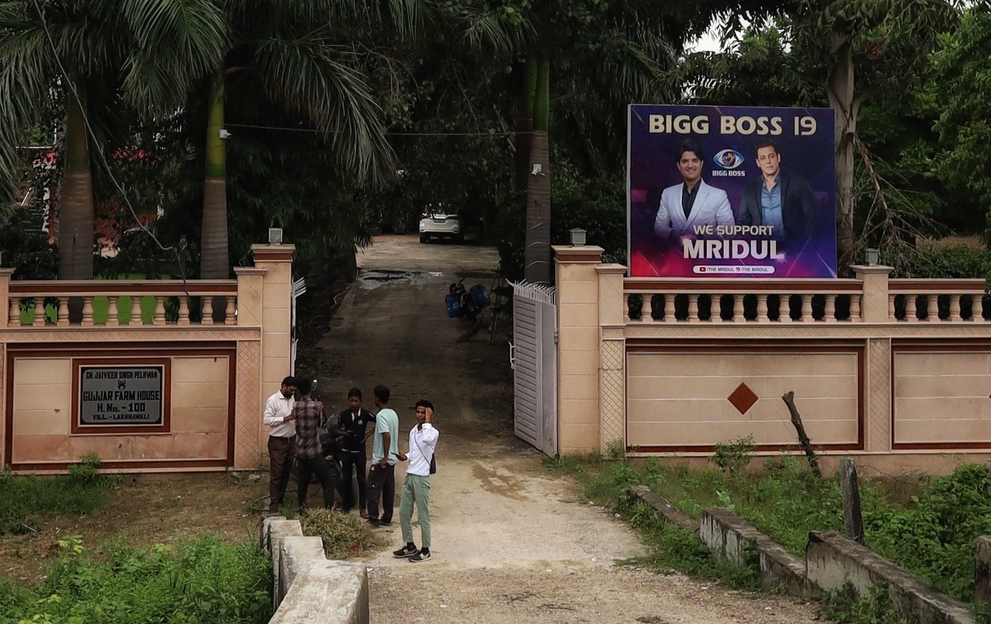 A banner in support of Mridul Tiwari outside a farmhouse in Lakhnawali, Greater Noida | Photo: Manisha Mondal | ThePrint