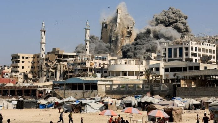 Smoke rises from the Al-Ghefari tower after it was hit by Israeli air strikes on 16 September 2025. | Dawoud Abu Alkas | Reuters