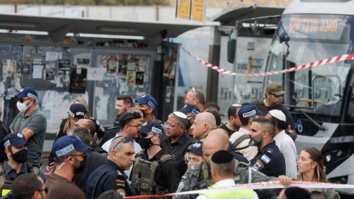 Israel's National Security Minister Itamar Ben Gvir looks on at the scene where a suspected shooting attack took place at the outskirts of Jerusalem, 8 September 2025. | Ammar Awad | Reuters