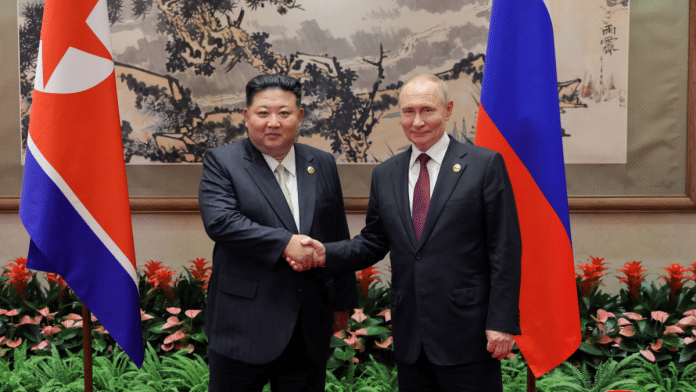 North Korean leader Kim Jong Un shakes hands with Russian President Vladimir Putin as they attend a ceremony to mark the 80th anniversary of the end of World War Two, in Beijing, China, in this picture released by the Korean Central News Agency on September 4, 2025 | Reuters