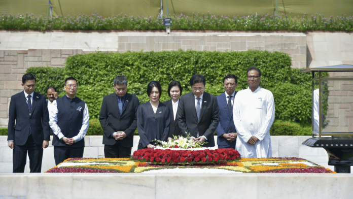 PM Lawrence Wong of Singapore paid tributes to Mahatma Gandhi by laying a wreath at Raj Ghat. | X\@MEAIndia