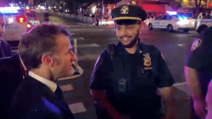 French President Emmanuel Macron after a New York City police officer stopped him crossing the street because of U.S. President Donald Trump's motorcade. | Screengrab | Social media