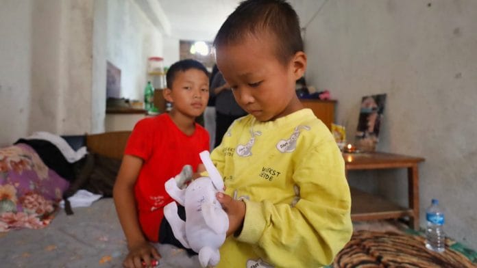 Renchen and Jimi Rai at their home in Bhaktapur, waiting for their father to return | Manisha Mondal | ThePrint