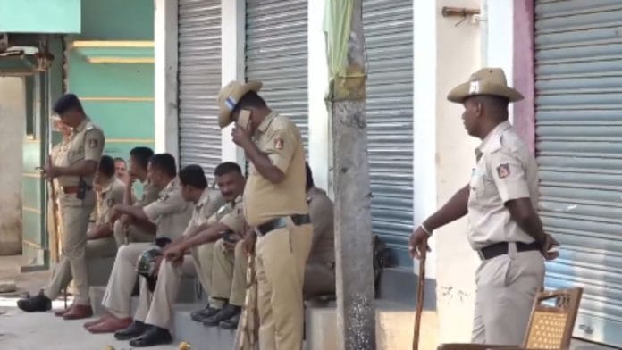 Police personnel stand guard after Mandya clashes | Screengrab from X video