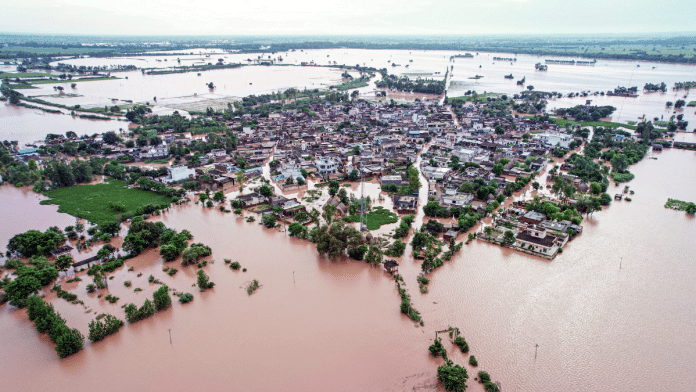 An aerial view of an area partially submerged in floodwater at Ghanaur village, in Patiala, on 4 September 2025. | PTI