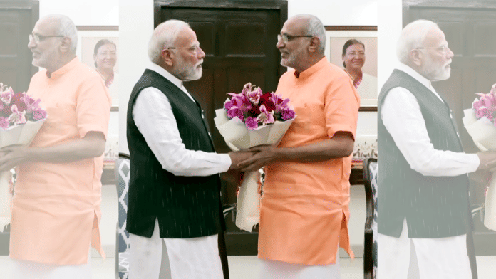Prime Minister Narendra Modi meets and congratulates CP Radhakrishnan on being elected as the Vice President of India, in New Delhi on Tuesday. | DD | Screengrab | ANI