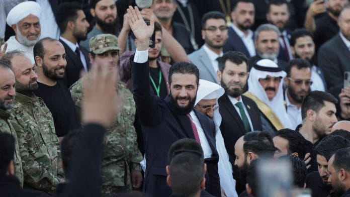 Syria’s interim President Ahmed al-Sharaa waves as he attends the “Aleppo, Key to Victory” celebration marking Syria’s liberation, in Aleppo on 27 May 2025. | File Photo | Khalil Ashawi | Reuters