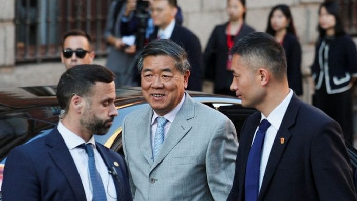 Chinese Vice Premier He Lifeng is escorted by security personnel to Santa Cruz Palace, on the day of U.S.-China talks on trade, economic and national security issues, in Madrid 15 September 2025. | Violeta Santos Moura | Reuters
