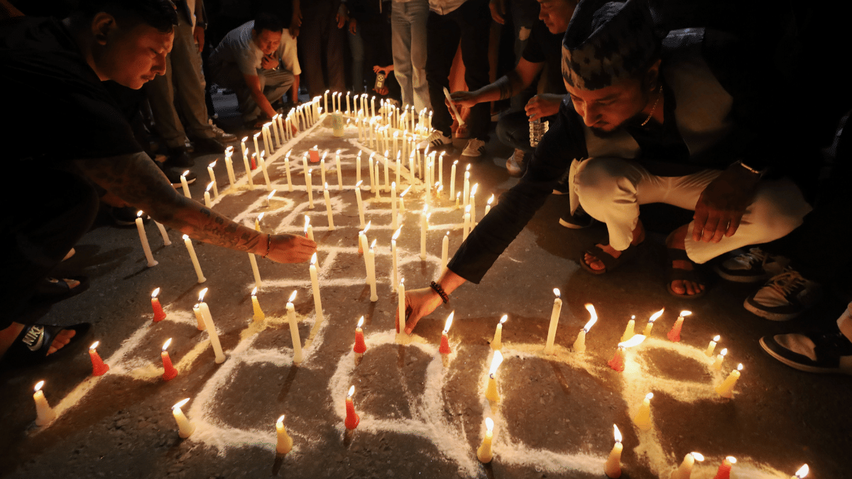 Traders, tourists and mourners light candles in solidarity of the people killed in Nepal protests, in Kathamandu's Thamel | Manisha Mondal | ThePrint