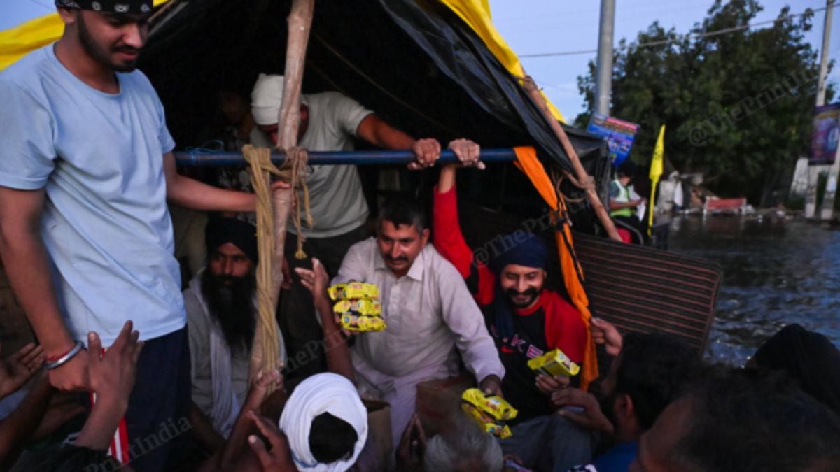 Food relief being provided to the vilagers | Suraj Singh Bisht | ThePrint