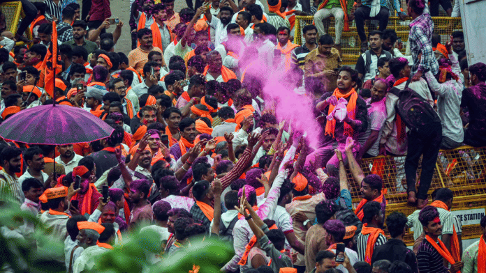 Supporters of the Maratha quota agitation celebrate in Mumbai Tuesday after the Maharashtra government agreed to their demands. | ANI
