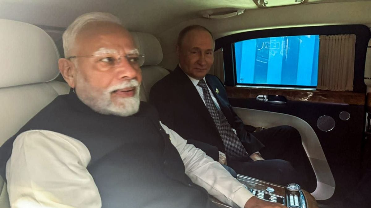 Prime Minister Narendra Modi and Russian President Vladimir Putin share a car together to the venue of their bilateral meeting, in Tianjin
