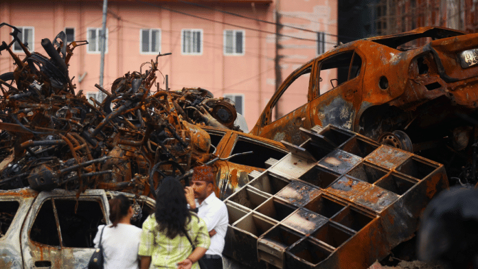 Charred remains of cars, motorcyles and office furniture inside the Supreme Court complex in Kathmandu | ThePrint | Manisha Mondal