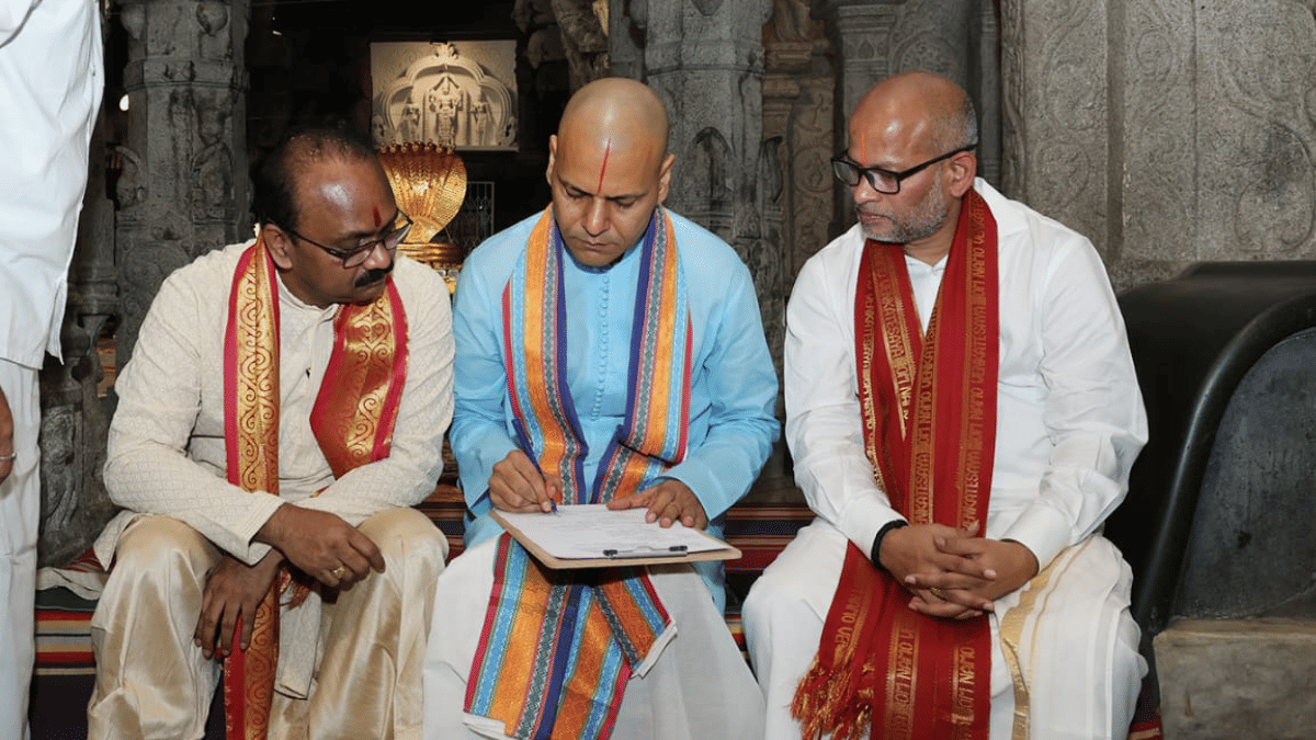 IAS officer Anil Kumar Singhal takes charge as TTD executive officer inside the shrine. On his right is outgoing EO Syamala Rao. | By Special arrangement 