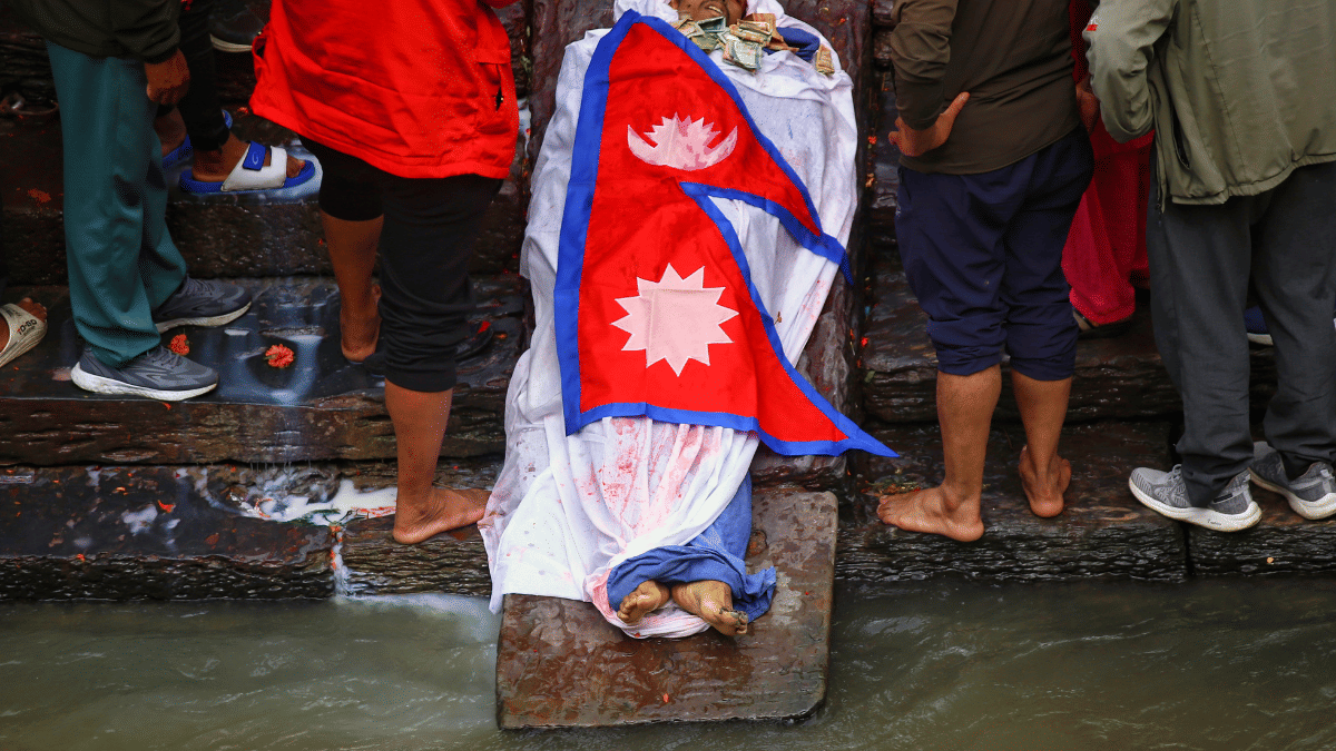 Body of Mahen Budhathoki kept on the banks of Bagmati river at Pashupatinath Ghat for last rites. | Manisha Mondal/ThePrint