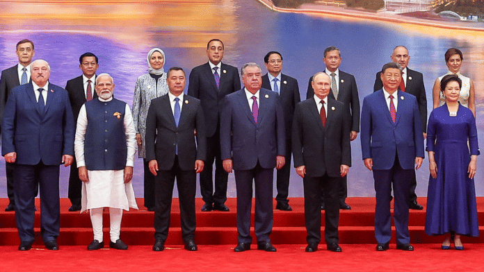 Prime Minister Narendra Modi, in a group picture with Chinese President Xi Jinping, his wife Peng Liyuan, Russian President Vladimir Putin and other SCO leaders, during the Official Reception for Heads of States and Heads of Governments at the SCO Summit, in Tianjin | ANI