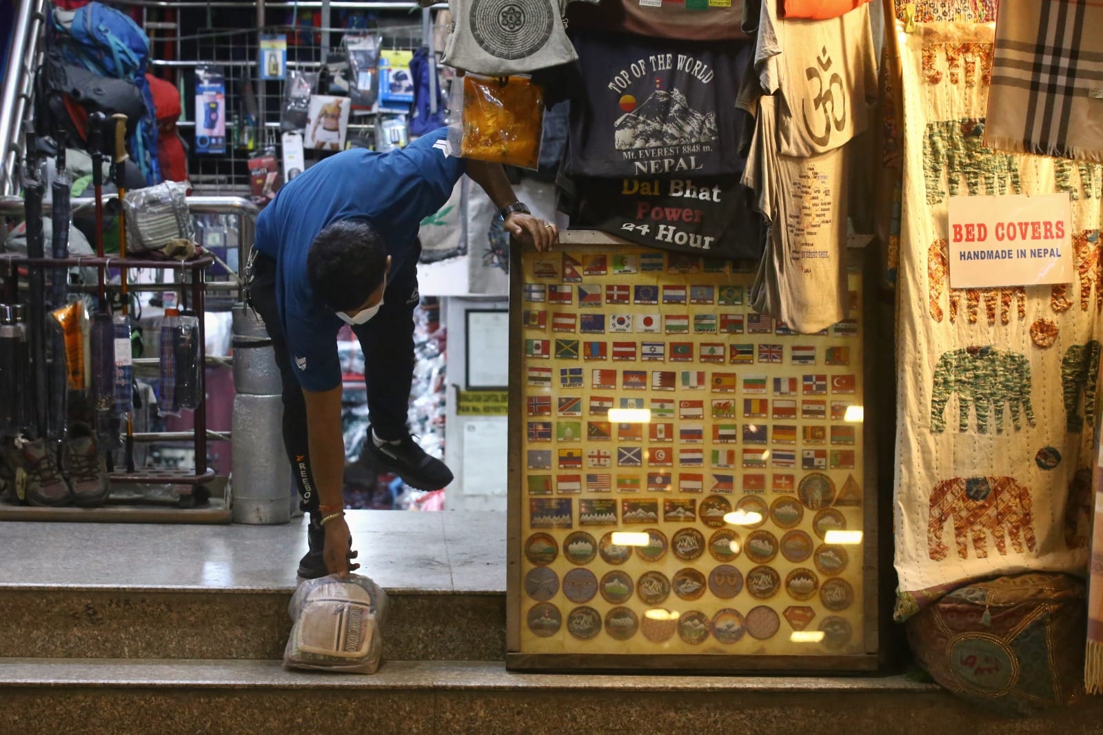 A shopkeeper opens his shop after a gap of five days following the upheaval in Kathmandu and other cities of Nepal | Manisha Mondal | ThePrint