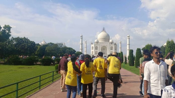 The group wore bright yellow T-shirts with 'Yes I Can Travel' written on them | Almina Khatoon, ThePrint
