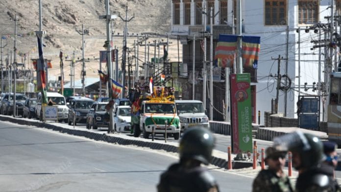 Funeral procession of ex-serviceman Tsewang Tharchin moves through the heavily guarded streets of Leh | Suraj Singh Bisht | ThePrint