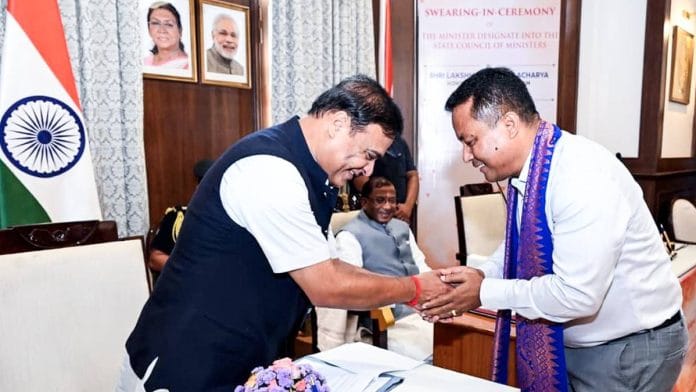 Bodoland People’s Front (BPF) MLA Charan Boro (right) greets Assam Chief Minister Himanta Biswa Sarma after being sworn-in as cabinet minister at the Raj Bhavan in Guwahati Saturday | Photo: ANI