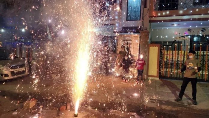 File photo of people bursting firecrackers to celebrate Diwali | ANI