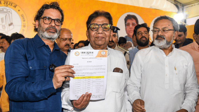 Jan Suraaj chief Prashant Kishor (left) with party National President Uday Singh during release of the party's second list of candidates for the upcoming Bihar polls, in Patna on 13 October 2025. | PTI