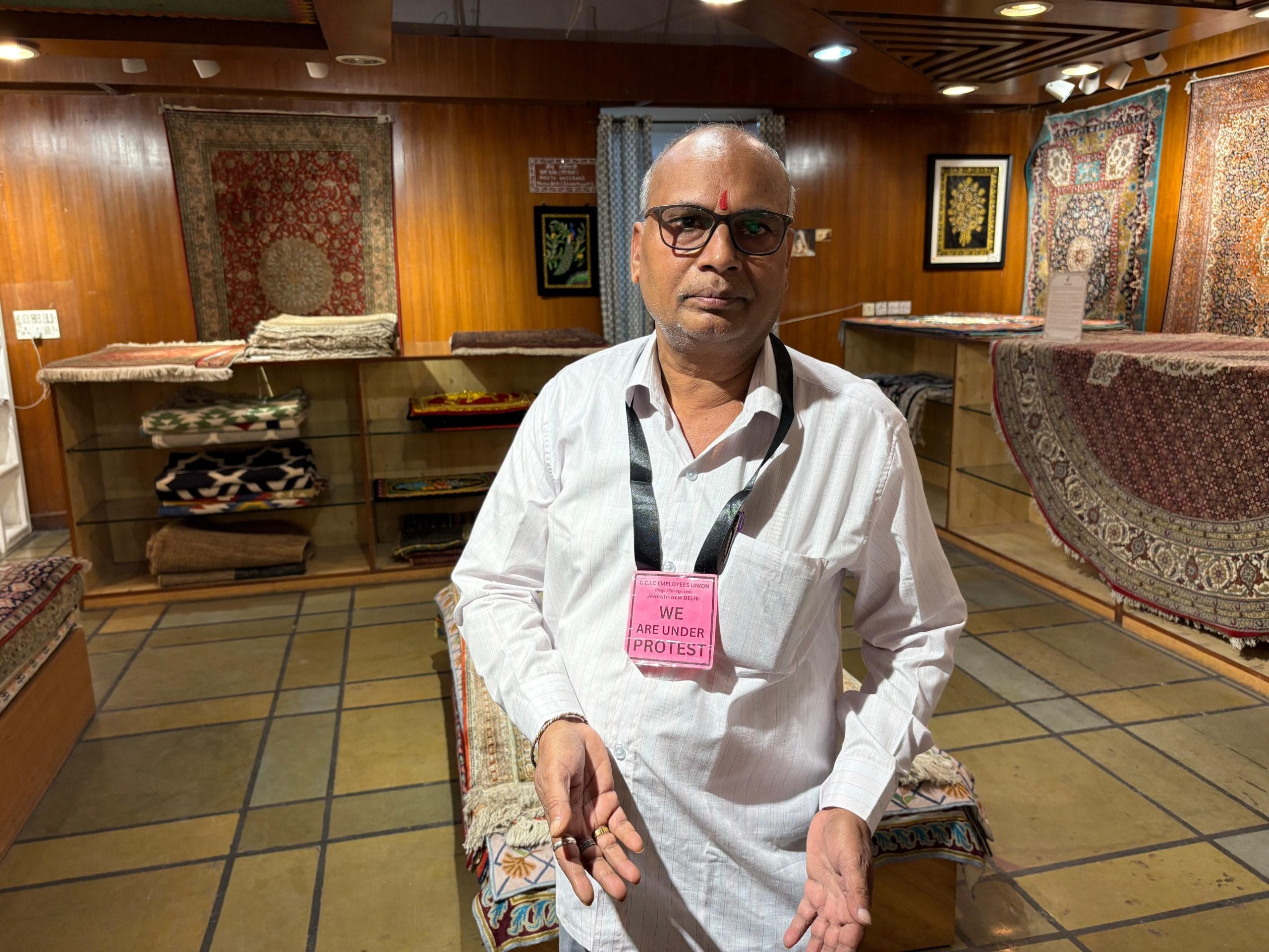 Shyam Narayan, a Cottage Emporium employee for 36 years, is on a silent protest | Photo: Sakshi Mehra, ThePrint