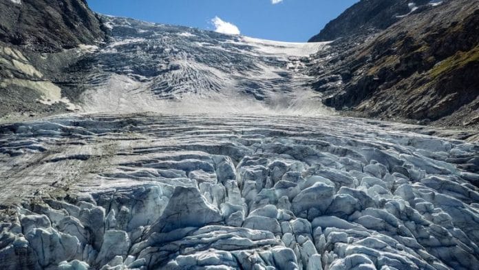 A drone view shows the Turtmann glacier on a warm summer day, amid climate change, in Turtmann on 3 September 2025. | Denis Balibouse | Reuters