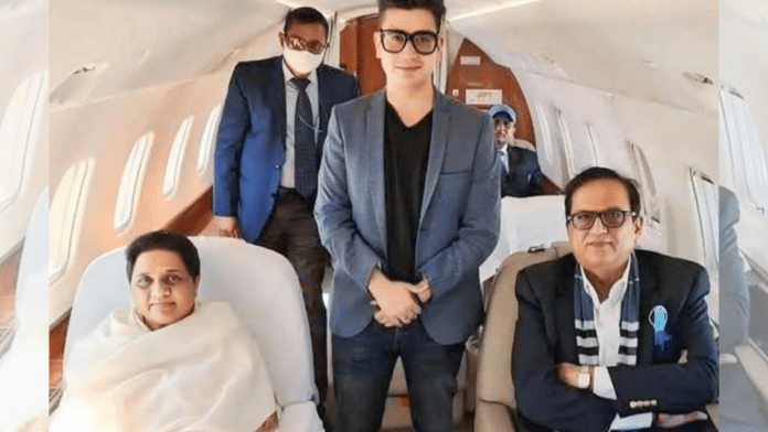 BSP chief Mayawati with Kapil Mishra (centre) and his father, senior party leader Satish Chandra Mishra | Photo: Kapil Mishra/Facebook