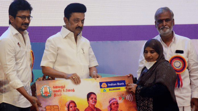 File photo of Tamil Nadu Chief Minister MK Stalin (second from left) felicitating a beneficiary during the second phase of the Kalaignar Magalir Urimai Thittam in Chennai | ANI