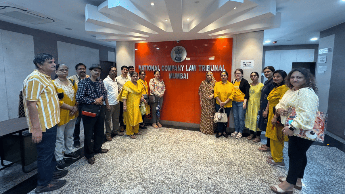 Affected HDIL homebuyers outside NCLT courtroom on a hearing date. | Manasi Phadke/ThePrint 