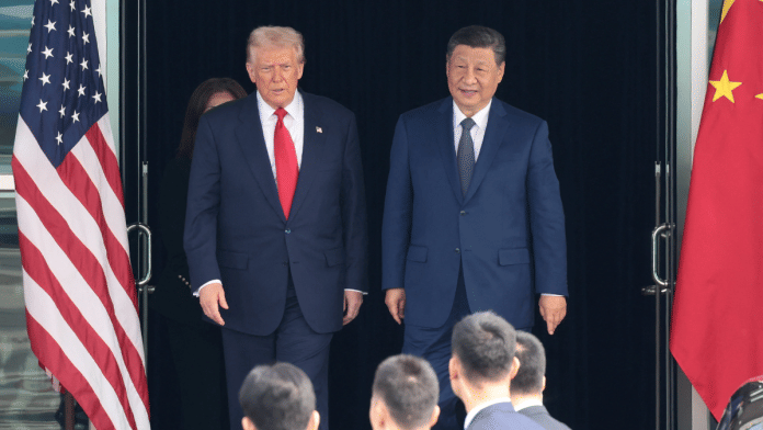 US President Donald Trump and Chinese President Xi Jinping after a bilateral meeting at Gimhae International Airport, on the sidelines of APEC summit, in Busan, South Korea, on 30 October, 2025 | Reuters