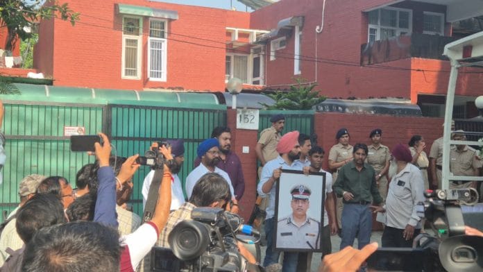 IPS officer Y Puran Kumar's portrait brought out by family members | Photo: Shubhangi Misra | ThePrint