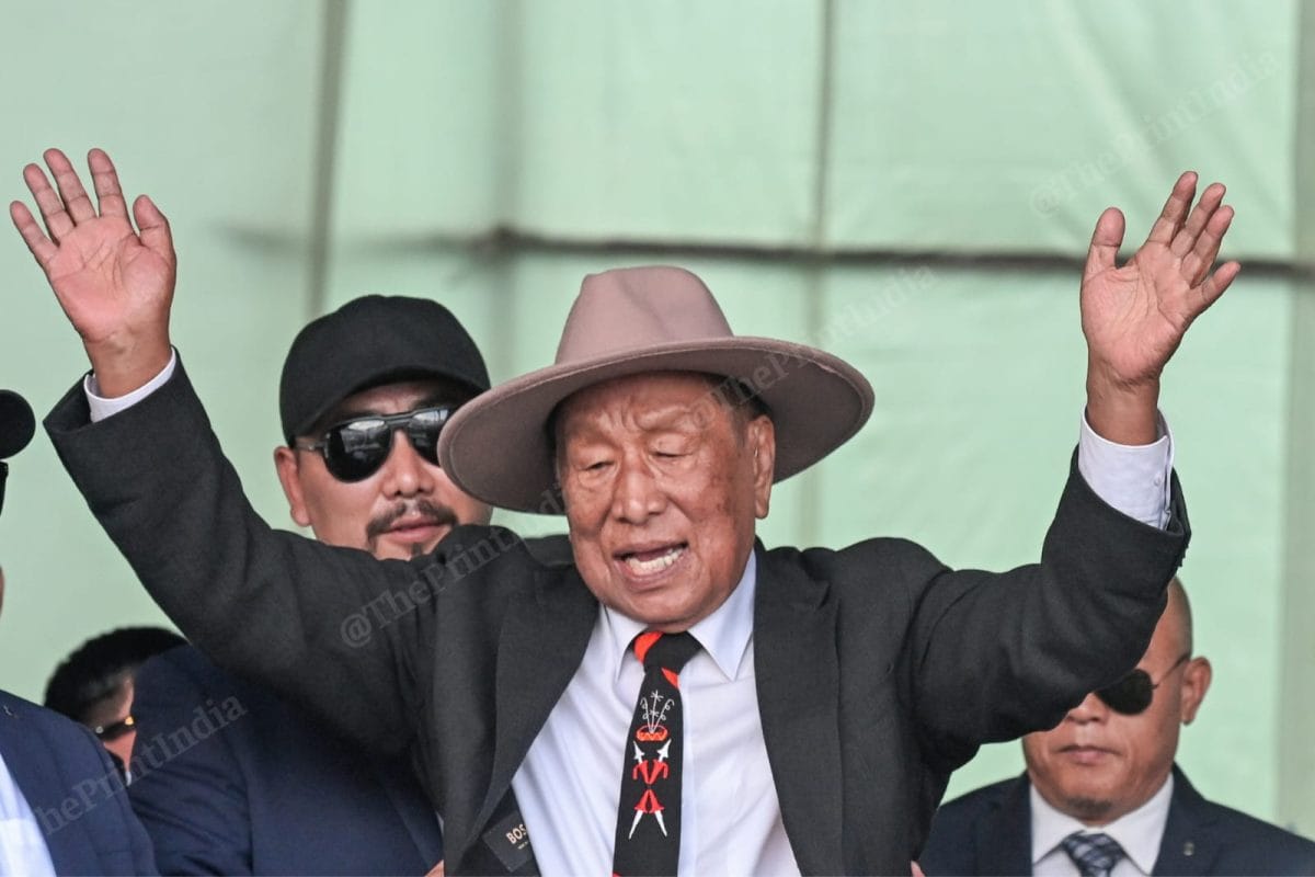 91-year-old Muivah waves to the crowd at Senapati ground | ThePrint/Suraj Singh Bisht
