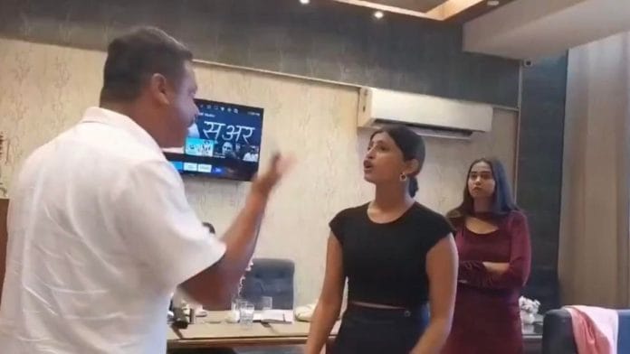 Screengrab from the video of the altercation between Raghavendra Bhatnagar, president of the Rashtriya Hindu Shakti Sangathan, and 23-year-old Muskan Sharma, the winner of Miss Rishikesh, on Friday | Source: X, @VoiceOfTribals_