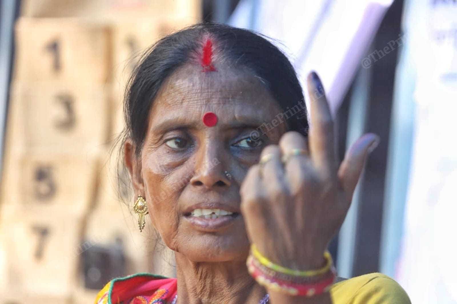 A woman voter displays finger with polling ink after exercising universal adult franchise during Bihar assembly polls | Praveen Jain | ThePrint