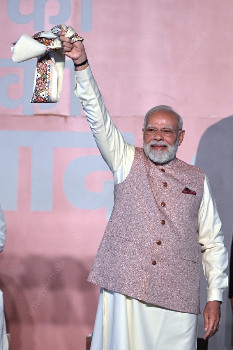 PM Modi waving a 'gamcha', at BJP HQ | Suraj Singh Bisht | ThePrint