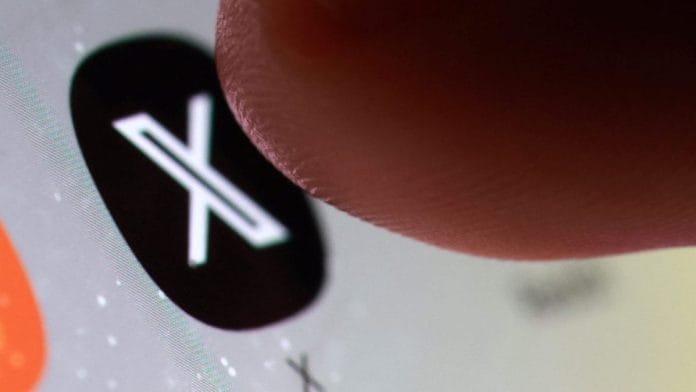 The X app icon on a smartphone in this illustration taken October 27, 2025 | Reuters