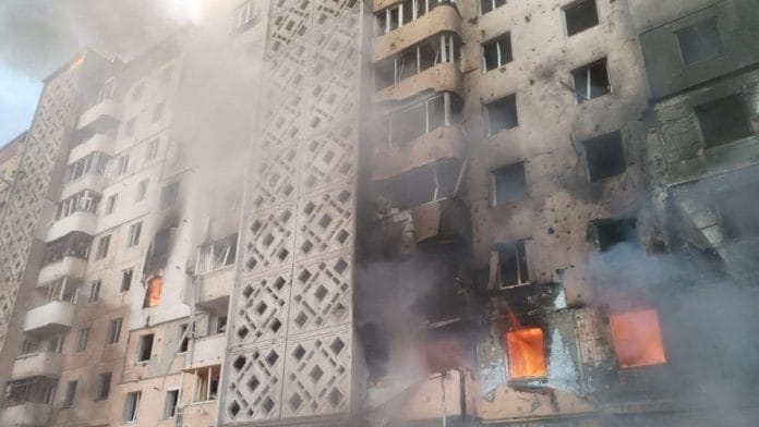 Residents walk in front of an apartment building which was damaged during a morning Russian missile strike, amid Russia's attack on Ukraine, in Ternopil, Ukraine November 19, 2025. Ukraine's President Volodymyr Zelenskiy via Telegram | Handout via Reuters