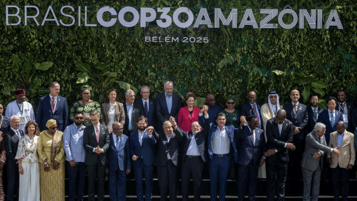 Luiz Inácio Lula da Silva, center, poses for a family photo with leaders ahead of the COP30 conference in Belém on Nov. 7 | Dado Galdeiri/Bloomberg