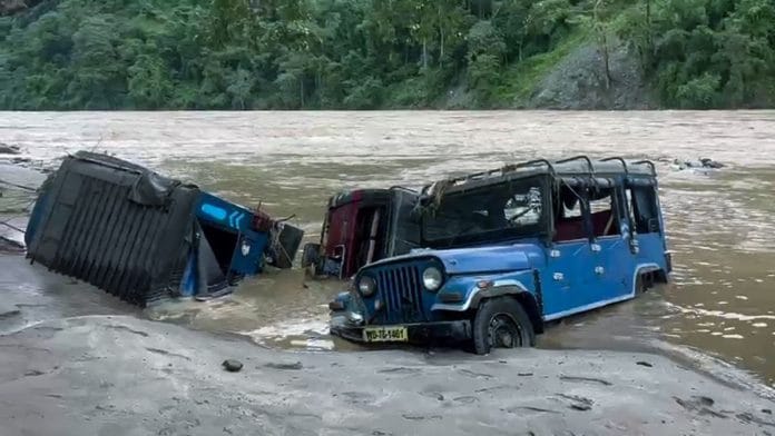 Vehicles partially submerged in flood water in Darjeeling in October 2025 | Representational image | ANI