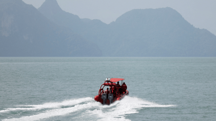 A Fire and Rescue Department boat heads out for a search and rescue operation after a boat carrying members of Myanmar's persecuted Rohingya community sank in waters near the Thailand-Malaysia border off Langkawi on 10 November 2025. | Hasnoor Hussain | Reuters