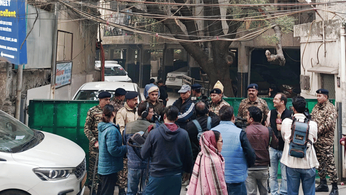 Security officials at the site after Enforcement Directorate conducts a search at the Delhi office of Al Falah University in Okhla on Tuesday | PTI