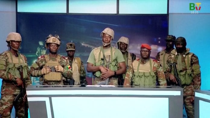 A group of soldiers gives a statement on Benin's national television, claiming to have seized power, following reports of a coup attempt underway against the government of Benin's President Patrice Talon, in Cotonou, Benin, in this screengrab from a handout video obtained by Reuters on December 7, 2025. Benin TV/Handout via REUTERS