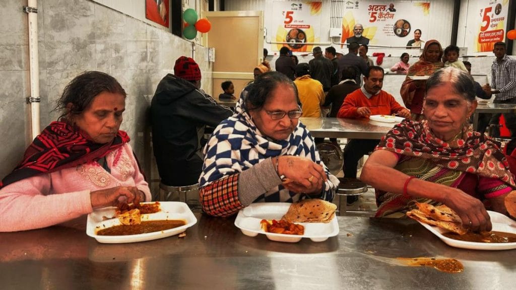 Kamla Devi, Godavari and Vidya Devi eating at the Kalkaji canteen. Manisha Mondal | ThePrint