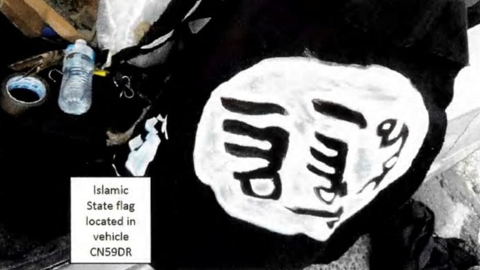 A homemade Islamic State flag found in the vehicle which is believed to have been used by Bondi beach attackers Sajid and Naveed Akram | NSW Police/Handout via REUTERS