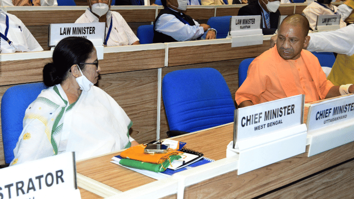 Representational image. | File photo of UP CM Yogi Adityanath and his West Bengal counterpart at a joint conference of CMs and Chief Justices of High Courts. | ANI file